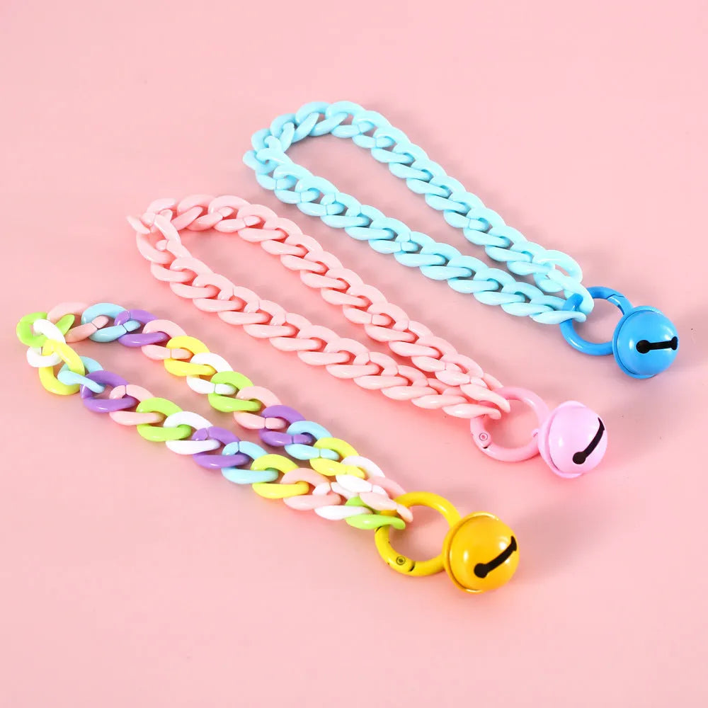 Adjustable plastic pet collar in macaron candy colours showing chain blue, pink and mixed options