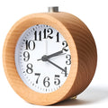 Solid beech wood silent snooze alarm clock with 4-inch dial on wooden surface