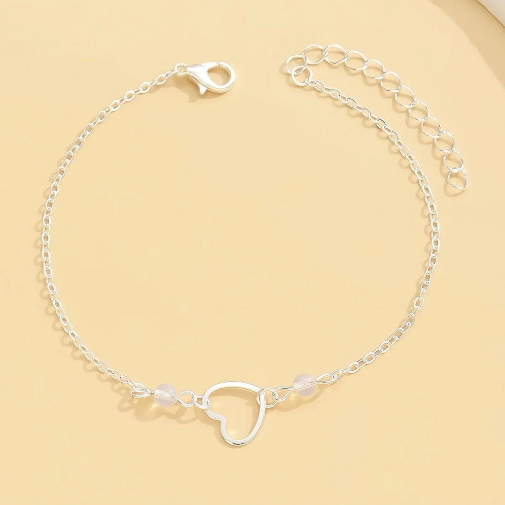 Women's adjustable anklet with heart pendant in gold or silver alloy