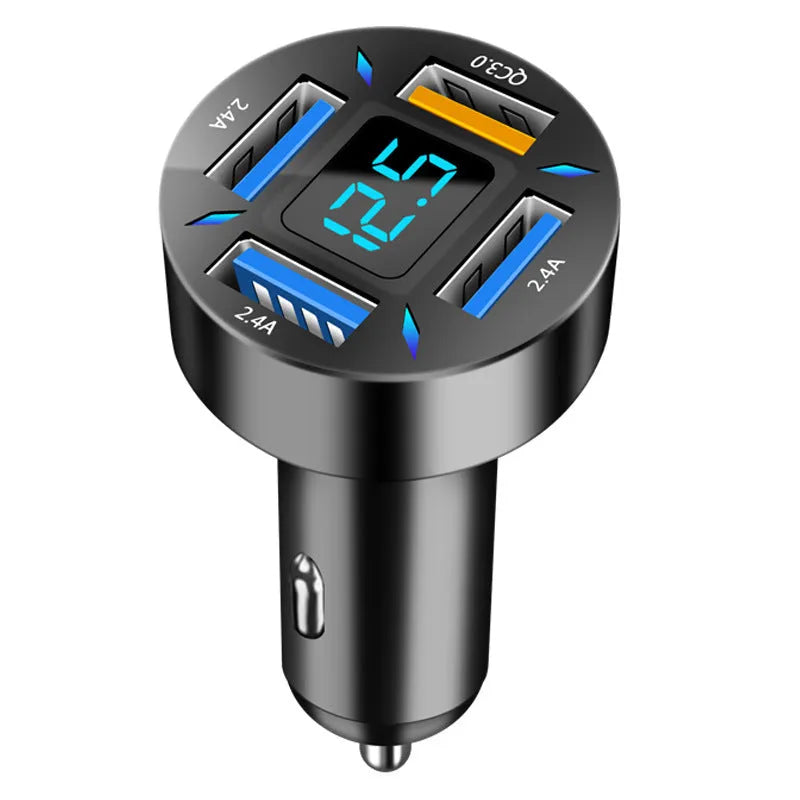 Black four-port USB car charger with LED digital display plugged into a vehicle socket.