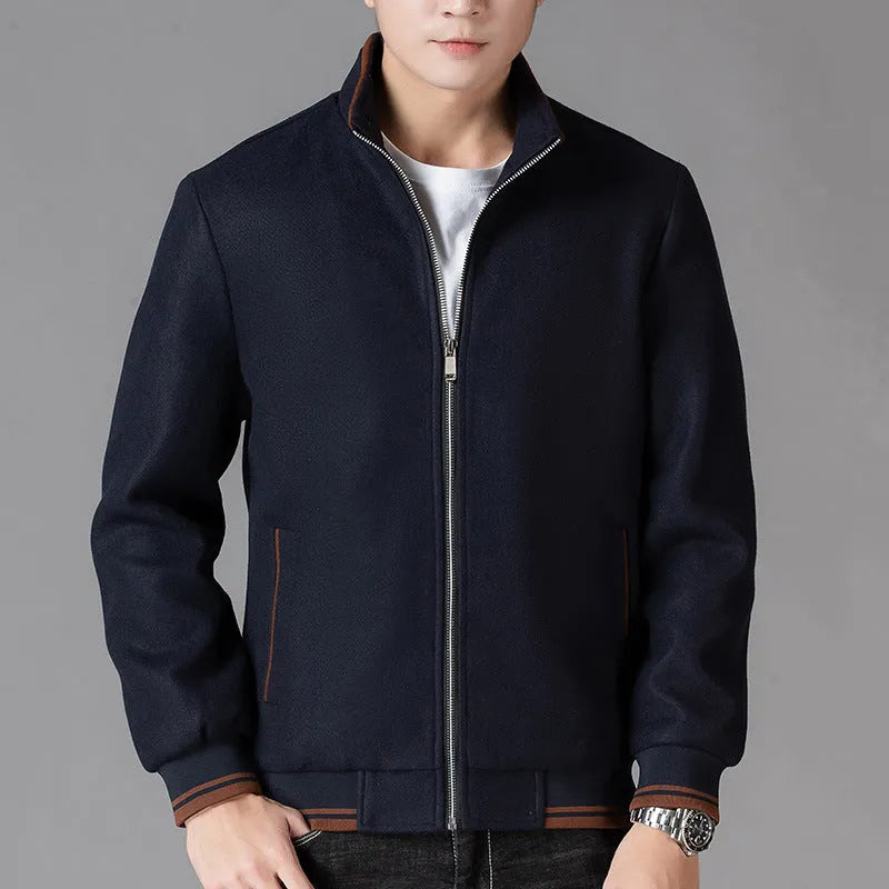 Men's grey polyester fleece sports jacket with long sleeves and a stick pocket.