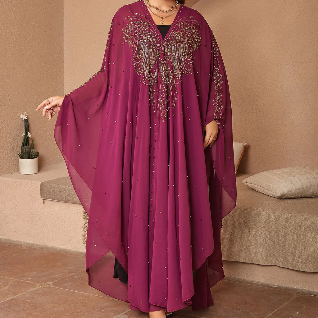 Purple Muslim style chiffon cape shawl with rhinestone beading laid flat.