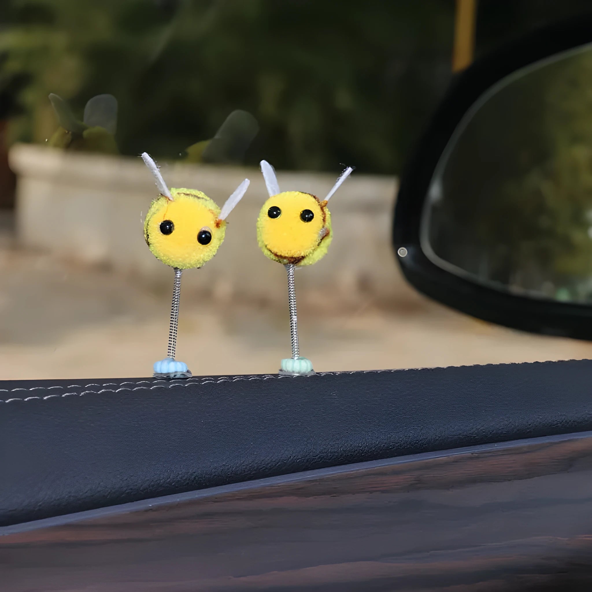 Swing Spring Bee car decoration showing a small, soft fur ball bee on a 3cm by 3cm scale.