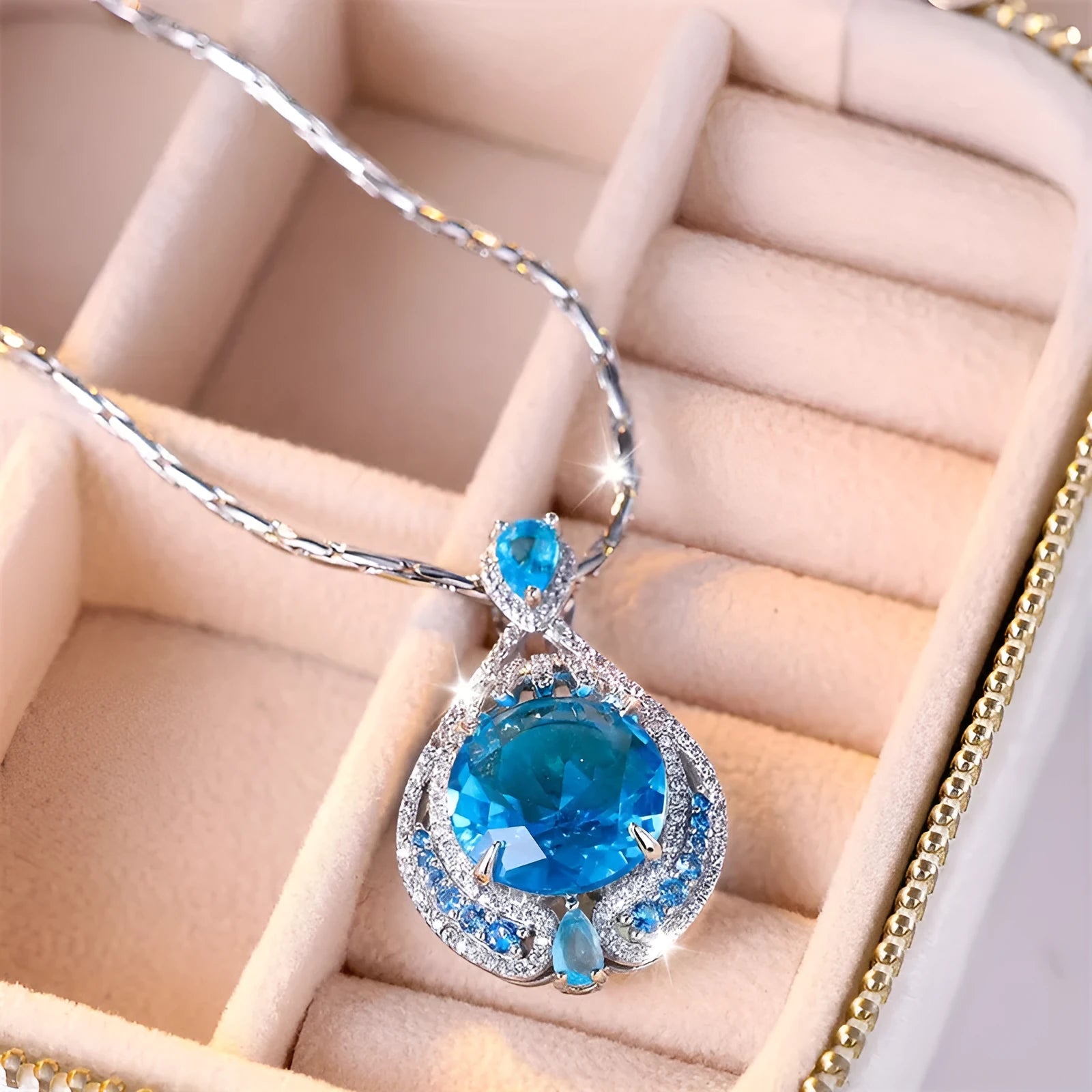 Blue geometric crystal pendant necklace with water wave chain, women's jewellery with fireworks-cut gems