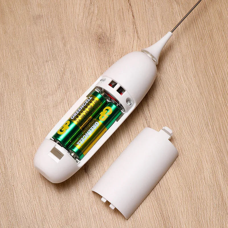 Hand-held electric milk frother in black and white colour options
