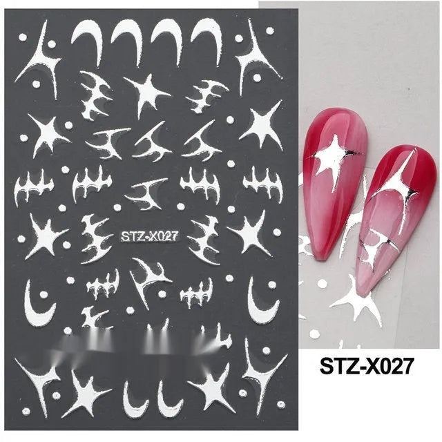 Cartoon love pattern nail art sticker decals in black and silver colours on a plastic sheet.