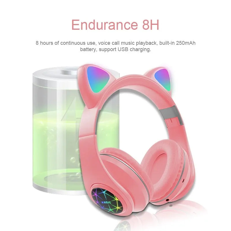 Colourful cat ear style wireless Bluetooth sports headset with a headband, shown in pink.