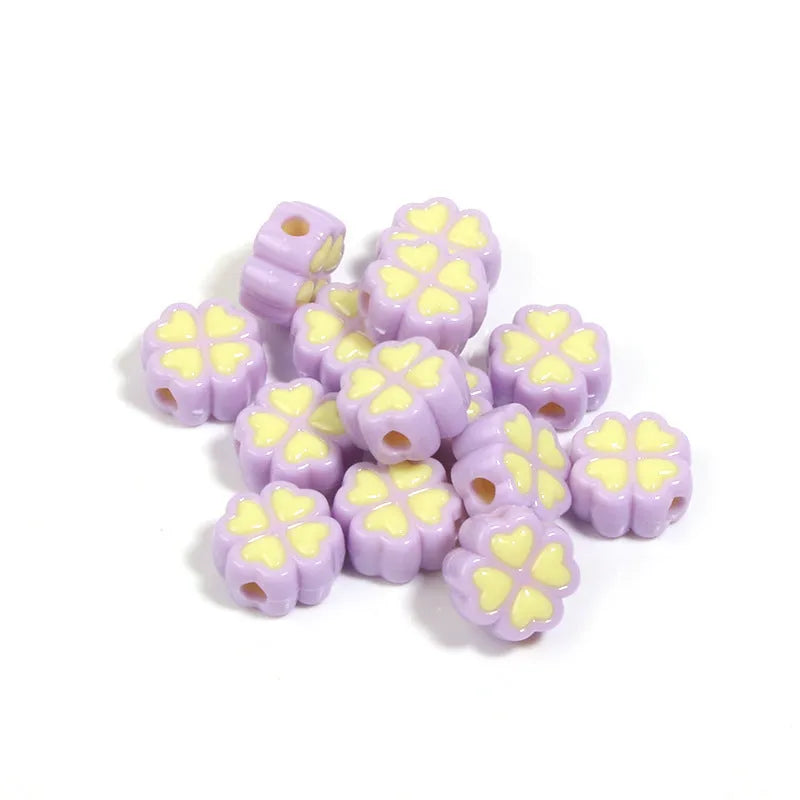 Acrylic four-leaf clover love beads with frosted finish in assorted light colours, 15mm size