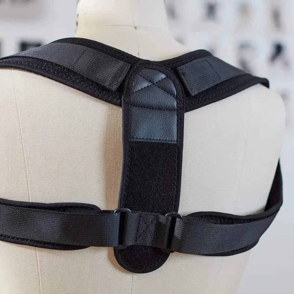 Black adjustable posture correction strap made from elastic fabric for back and shoulder support