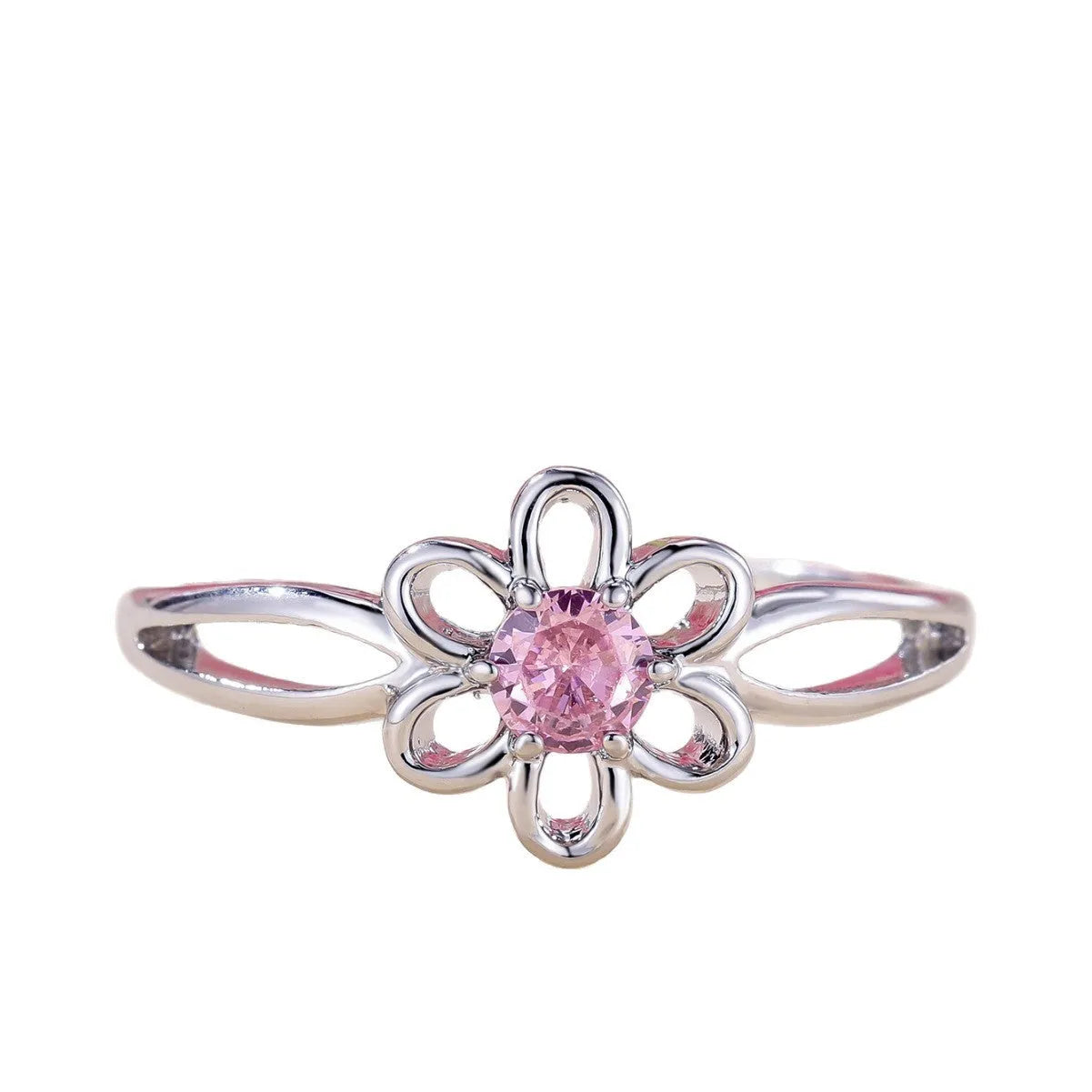 Close-up of a ladies floral hollow ring in electroplated copper with a platinum pink diamond finish.