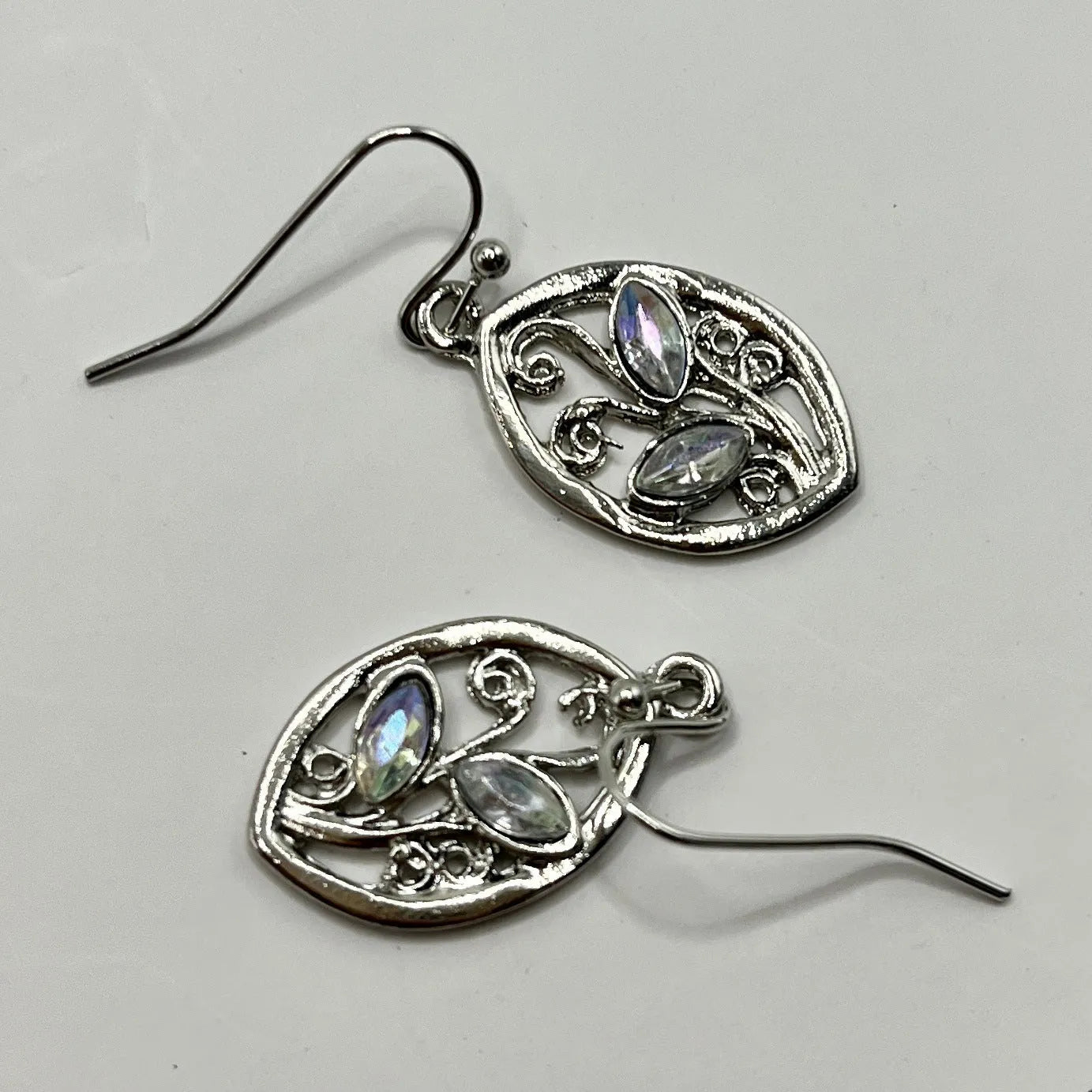 Silver leaf-shaped earrings with colourful embedded moonstones for women