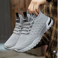 Men's casual mesh shoes in solid army green colour showing lightweight breathable upper and standard sole profile