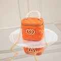 PVC bucket gel handbag with heart pattern in apricot colour showing flexible jelly construction