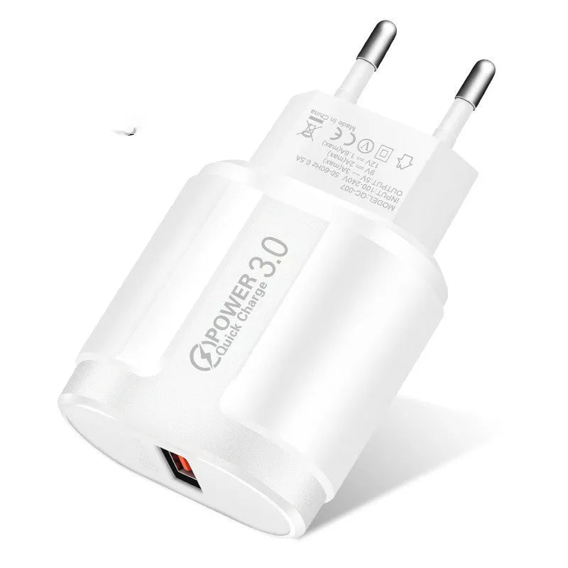 White and black smart mobile phone chargers with EU, UK, and US plug pins displayed.