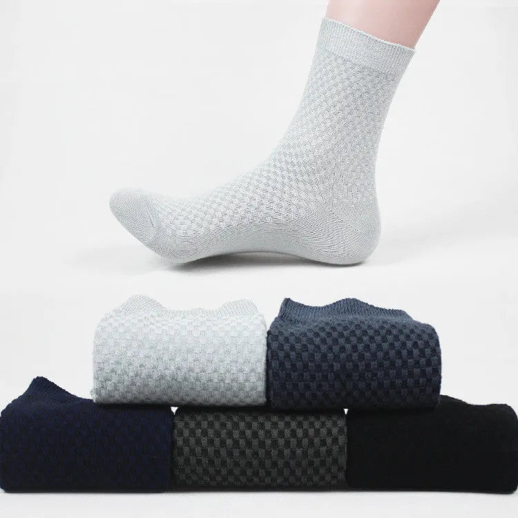 Men's bamboo fibre socks with small square pattern in black, grey, blue, and navy colours