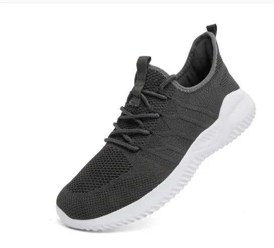 Men's black and white breathable sneakers with mesh upper and lace-up closure for casual sport
