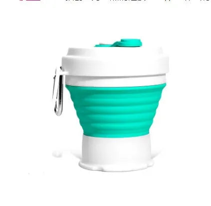 Blue double wall silicone cold shake cup with cylindrical shape and pinch activation for instant beverage cooling
