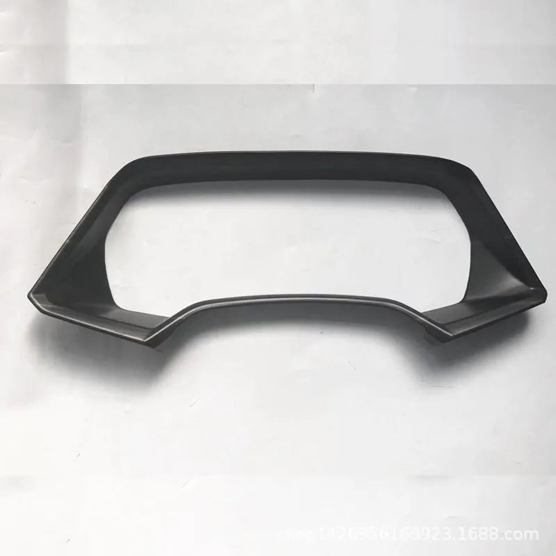 BMW X5 dashboard decorative frame in Peach Wood and Carbon Fiber finishes with double-sided adhesive tape
