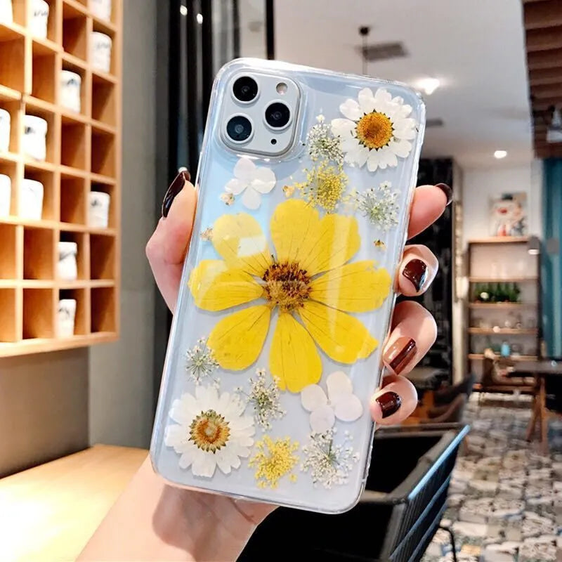 Floral pattern TPU mobile phone case for iPhone in pink and yellow colour options.