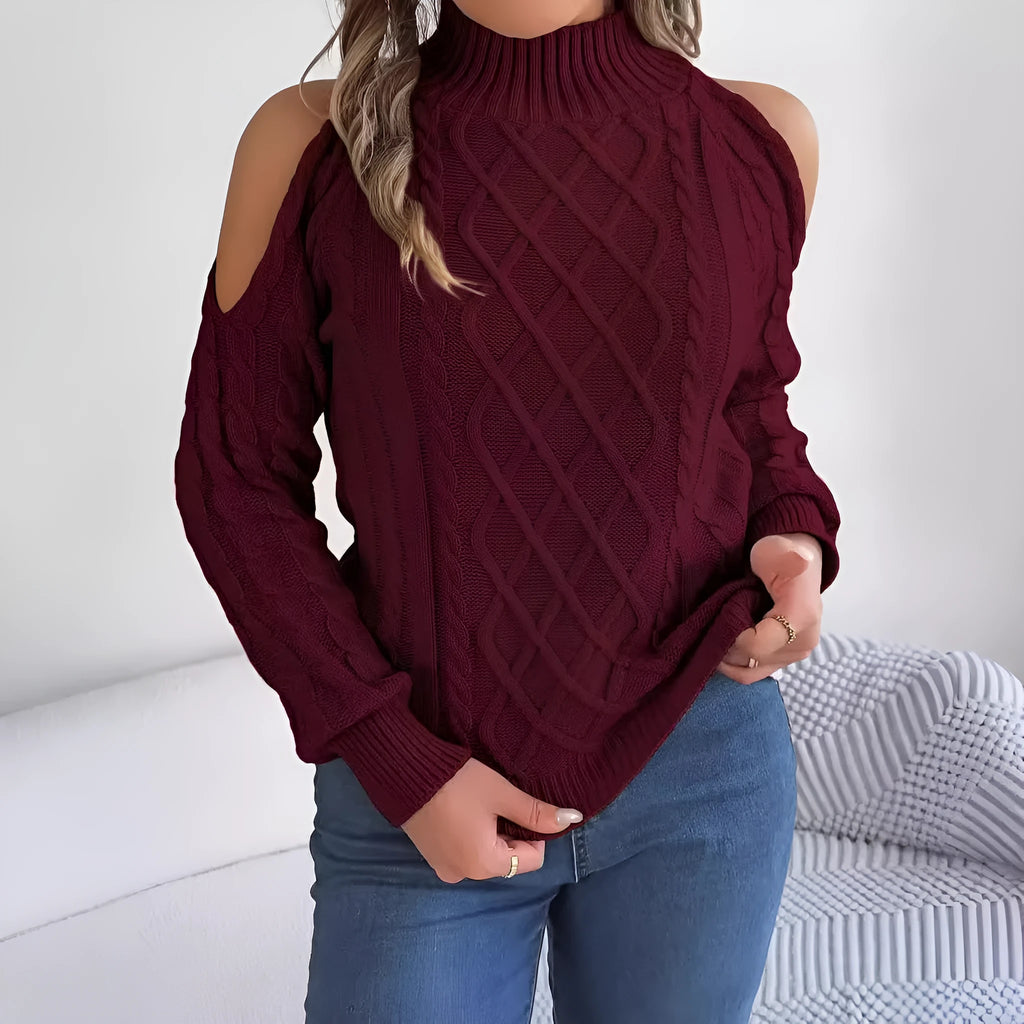 Women's grey twisted pattern pullover sweater with lantern sleeves and a half-high collar.