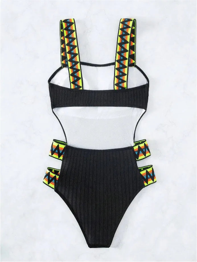Women's solid colour one-piece swimsuit in black or orange polyester fabric