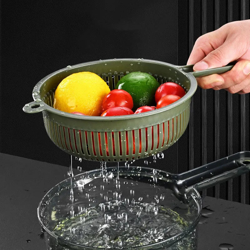Multifunctional vegetable slicer in grey or green with five stainless steel blades, hand guard and paring knife