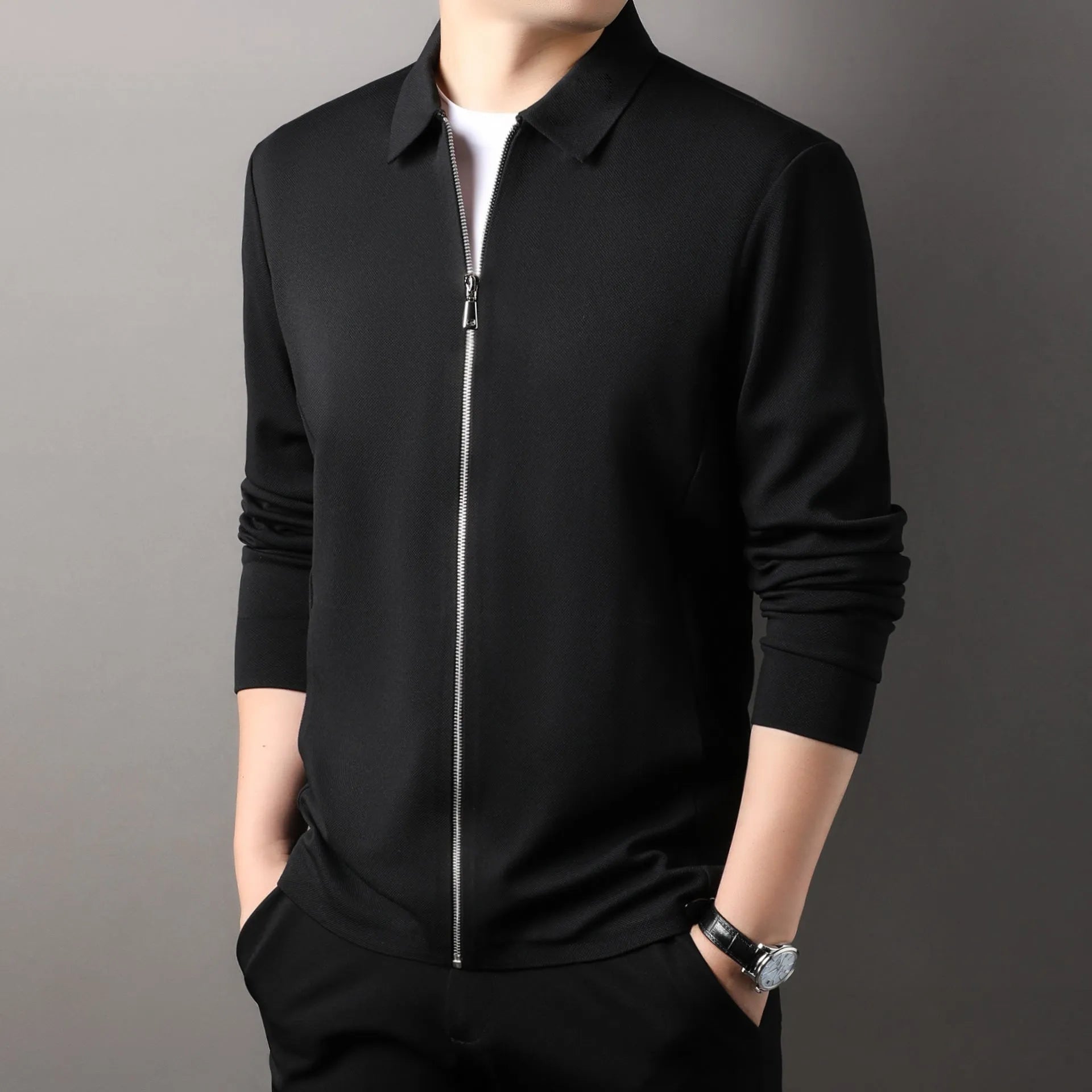 Men's jacket in polyester fabric, shown in black, dark grey, and apricot colours, featuring long sleeves and a straight hem.