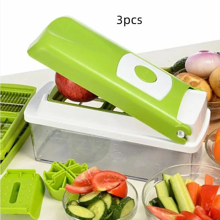 Green 12-piece manual food chopper set with stainless steel blades on a kitchen counter.