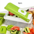 Green 12-piece manual food chopper set with stainless steel blades on a kitchen counter.