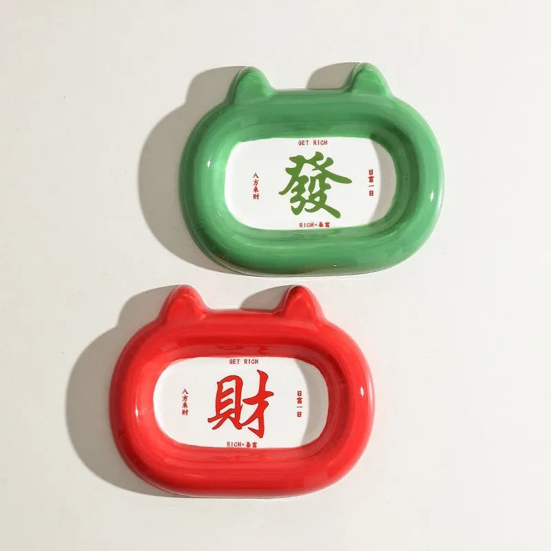 Ceramic pet bowl with an animal design, suitable for cat food or dog water.