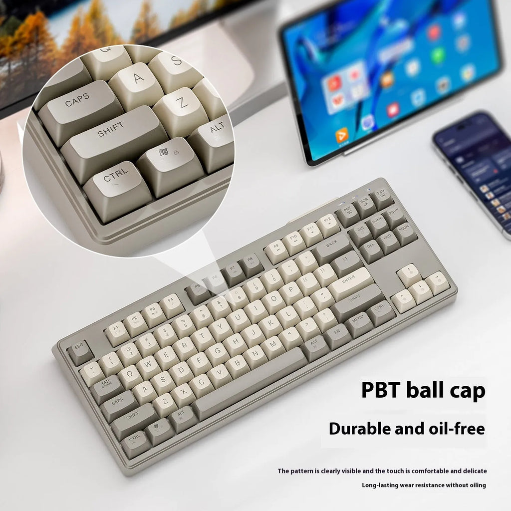 Free Wolf M87 wireless Bluetooth dual-mode mechanical feel keyboard in blueberry colour on a desk