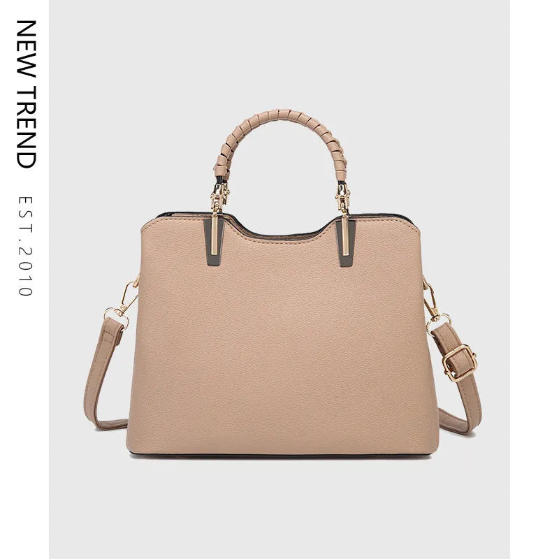 PU ladies handbag 25x12x19cm with single shoulder strap, zip pockets and contrast stitching