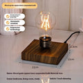 Iron art suspension bulb night lamp with black wood grain square base on desktop