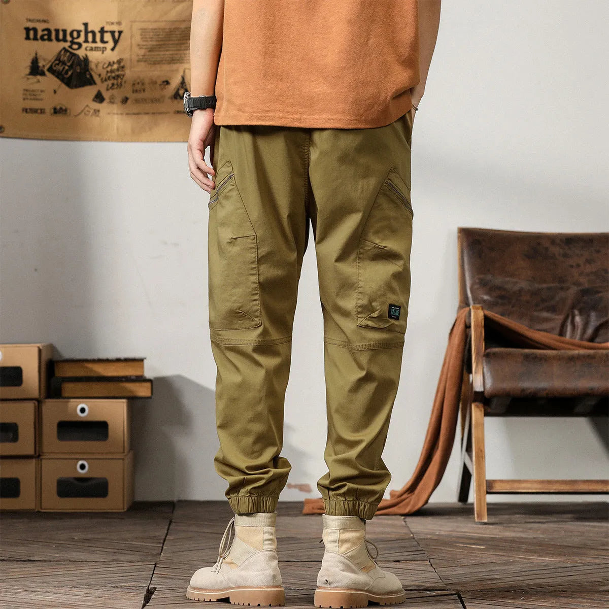 Men's American retro style tapered harem pants with ankle banded leg opening in cotton fabric