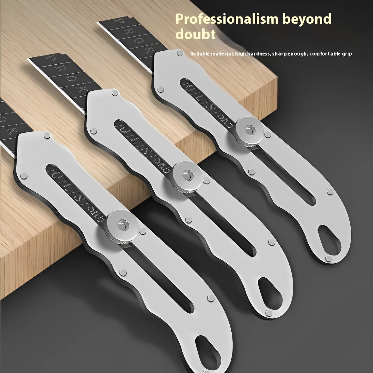 Stainless steel folding utility knife and art knife with black blade, plus spare long and trapezoidal blades.