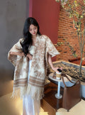 Women's polyester scarf cape with tassel trim in shawl style, free size fit