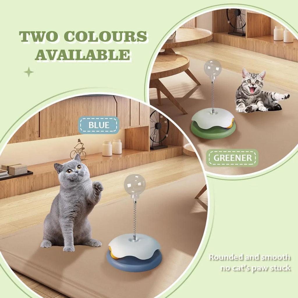 Blue and green PP plastic cat treat dispenser toy with a track ball on a textured base