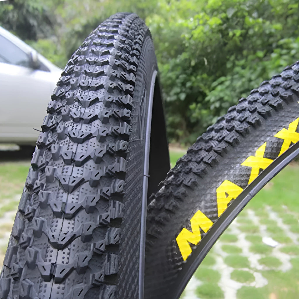 Mountain bike ultralight puncture proof tyre showing tread and white label sidewall option.