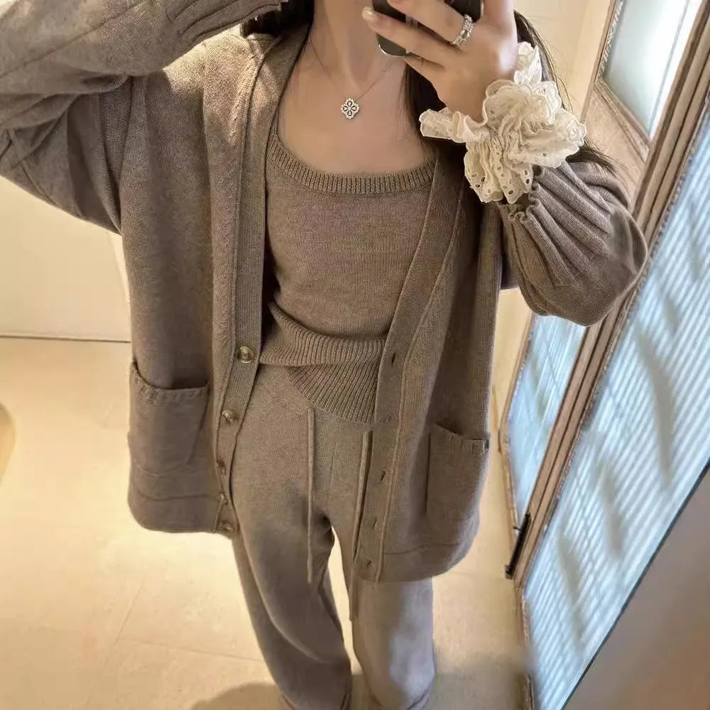 Women's knit cardigan and pants three-piece set in wool blend fabric shown in beige colour