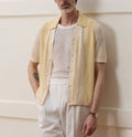 Yellow casual polo shirt with hollow-out design and asymmetric style in Tencel fabric