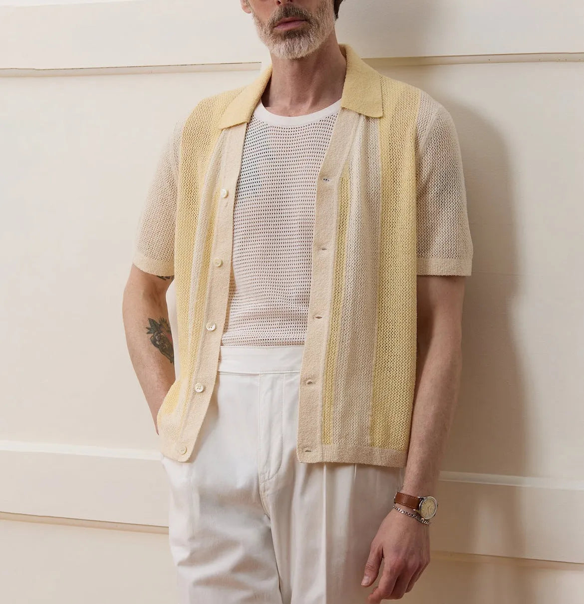 Yellow casual polo shirt with hollow-out design and asymmetric style in Tencel fabric