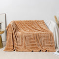 Thick coral fleece blanket in various sizes and colours including brown, white, blue, khaki, and green