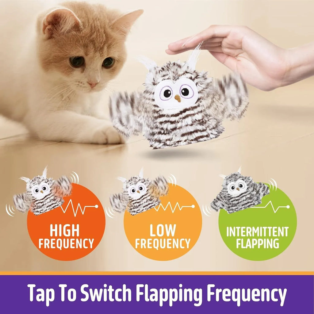 Grey automatic chirping owl cat toy with flapping wings on green background