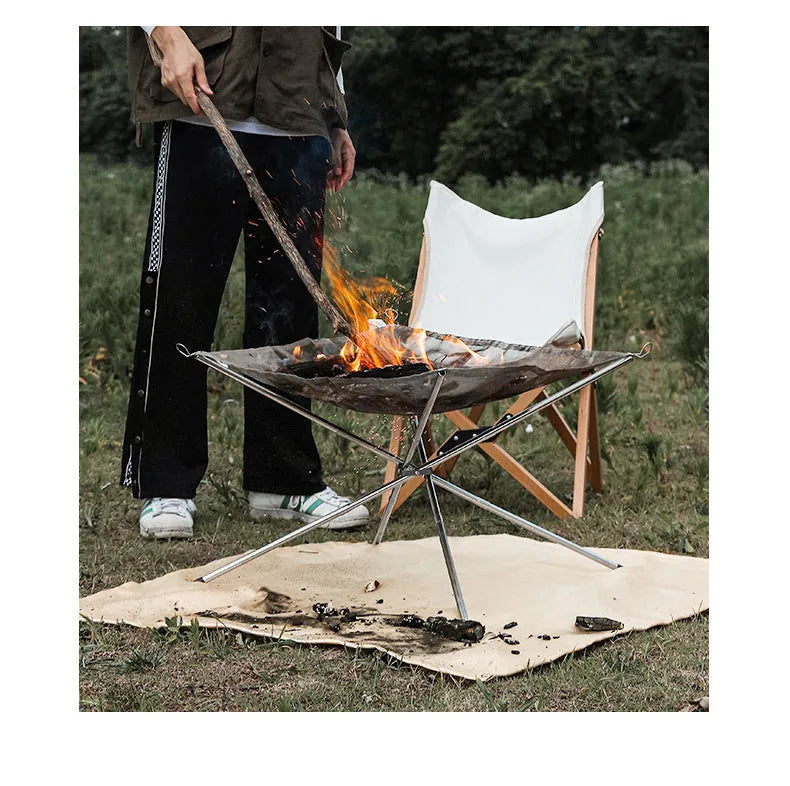 Silver stainless steel barbecue grill with removable cooking net, shown in a medium or large size for outdoor use.