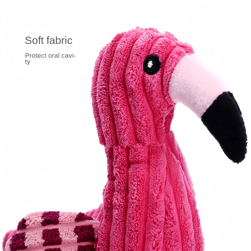 Pink animal-shaped corduroy dog toy with a squeaker inside on a white background.