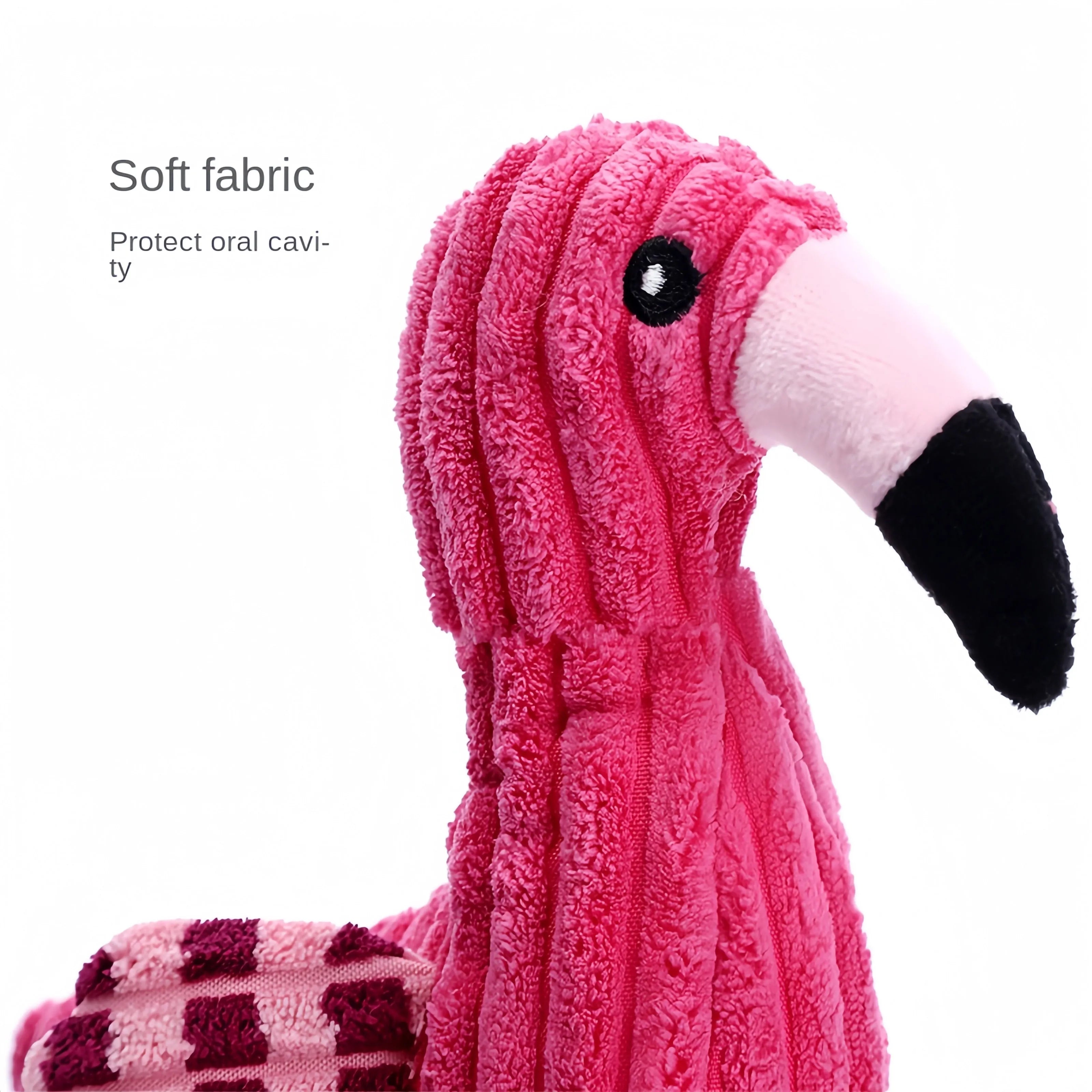 Pink animal-shaped corduroy dog toy with a squeaker inside on a white background.