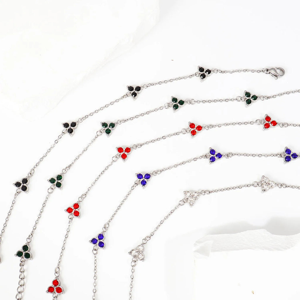 Women's geometric stainless steel bracelet with three-diamond triangle design and zircon stones