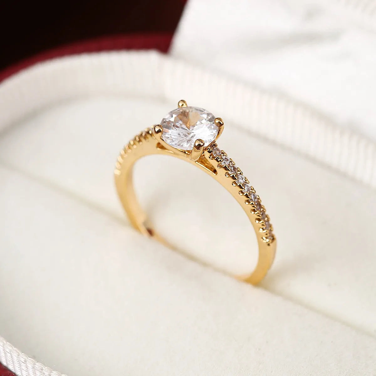 Geometric hexagon copper ring with zircon crystals in gold rose red finish