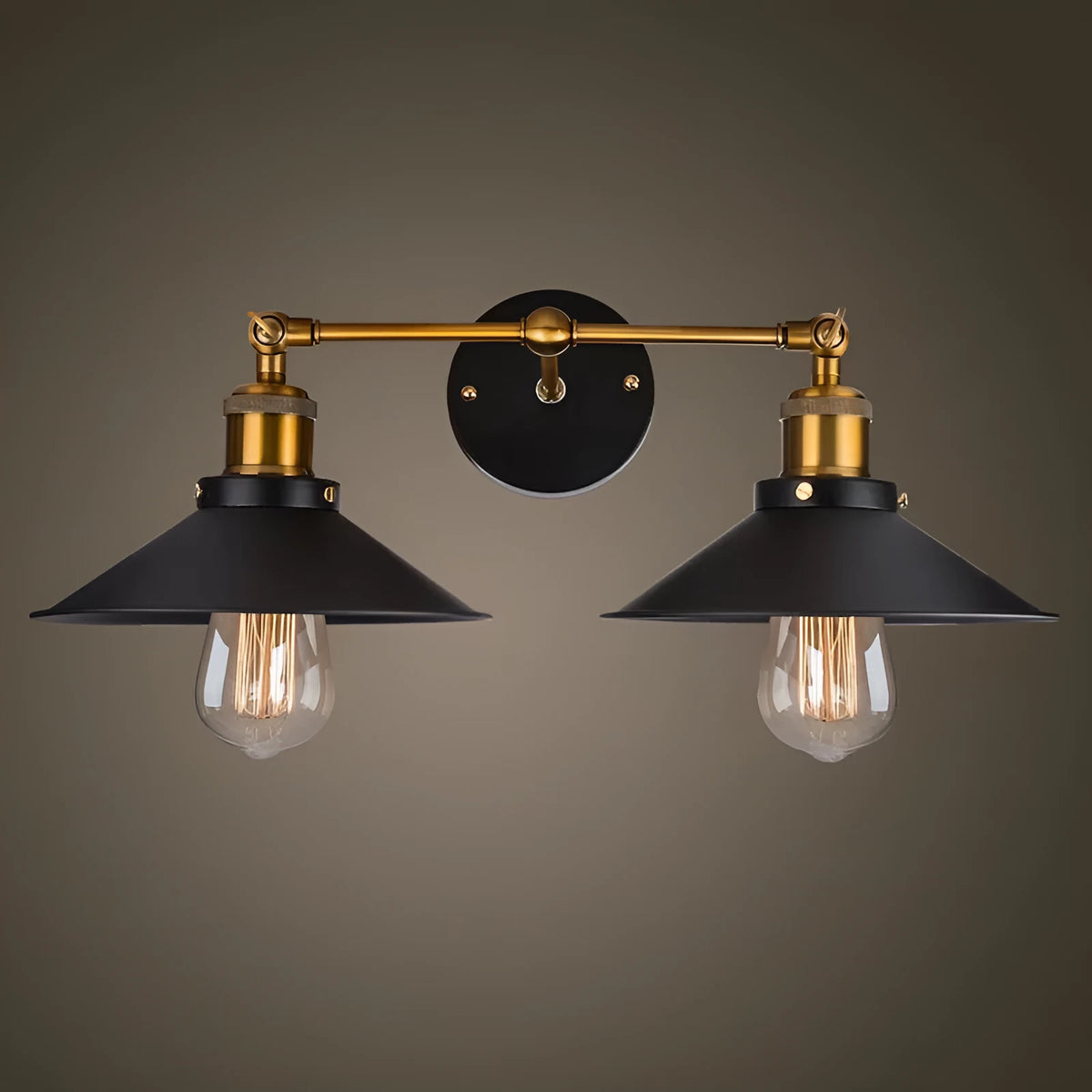 Black double head American retro industrial style iron wall lamp mounted on a wall.