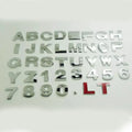 Silver and black metal zinc alloy 3D car bumper stickers showing letters A to Y, 2.5cm size